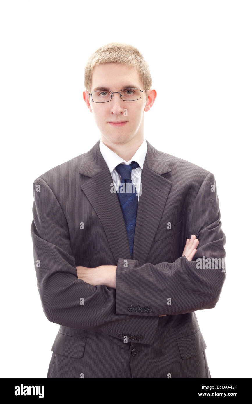 Young businessman cross-armed waiting to advise you Stock Photo