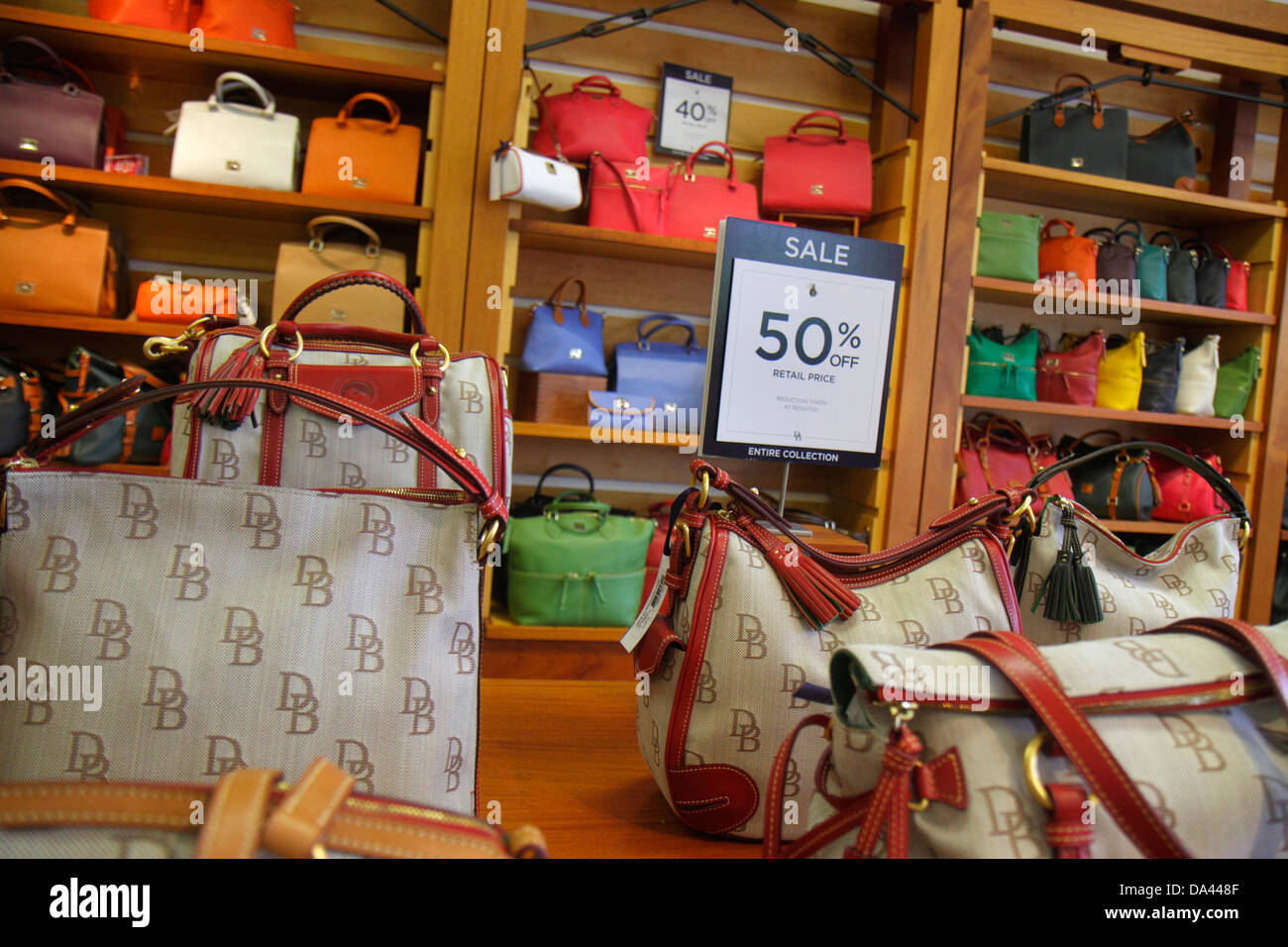Vero Beach Florida,Outlets,Dooney & and Bourke Factory Store,shopping  shopper shoppers shop shops market markets marketplace buying  selling,retail sto Stock Photo - Alamy