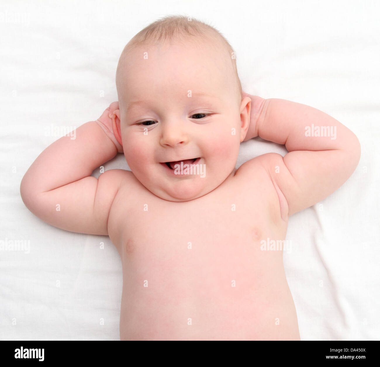 Happy baby on back Stock Photo