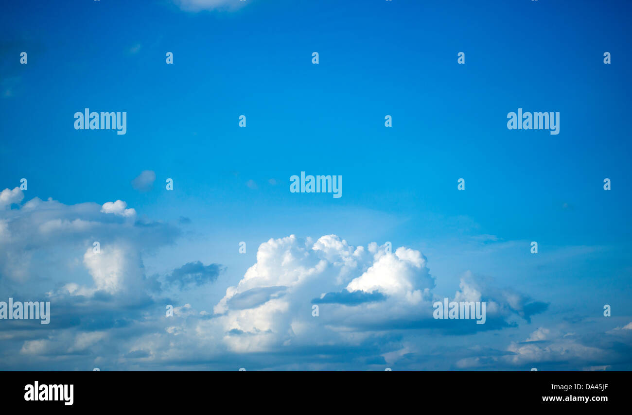 Puffy White Clouds against a Blue Sky Stock Photo - Alamy