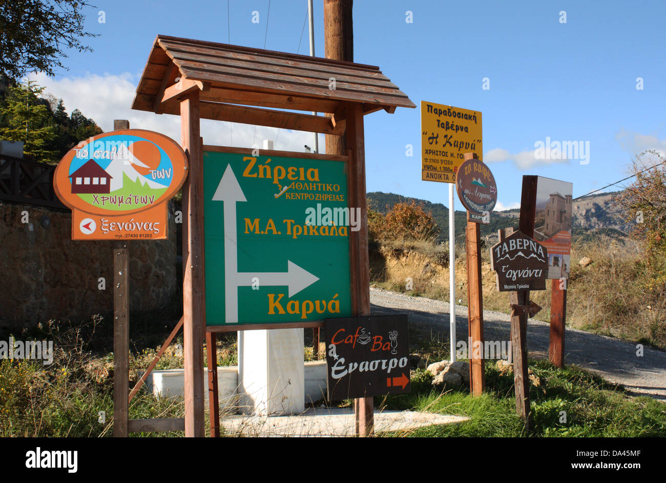 Direction signs, Mesaia Trikala, Oreina Corinthia, Peloponnese, Greece Stock Photo