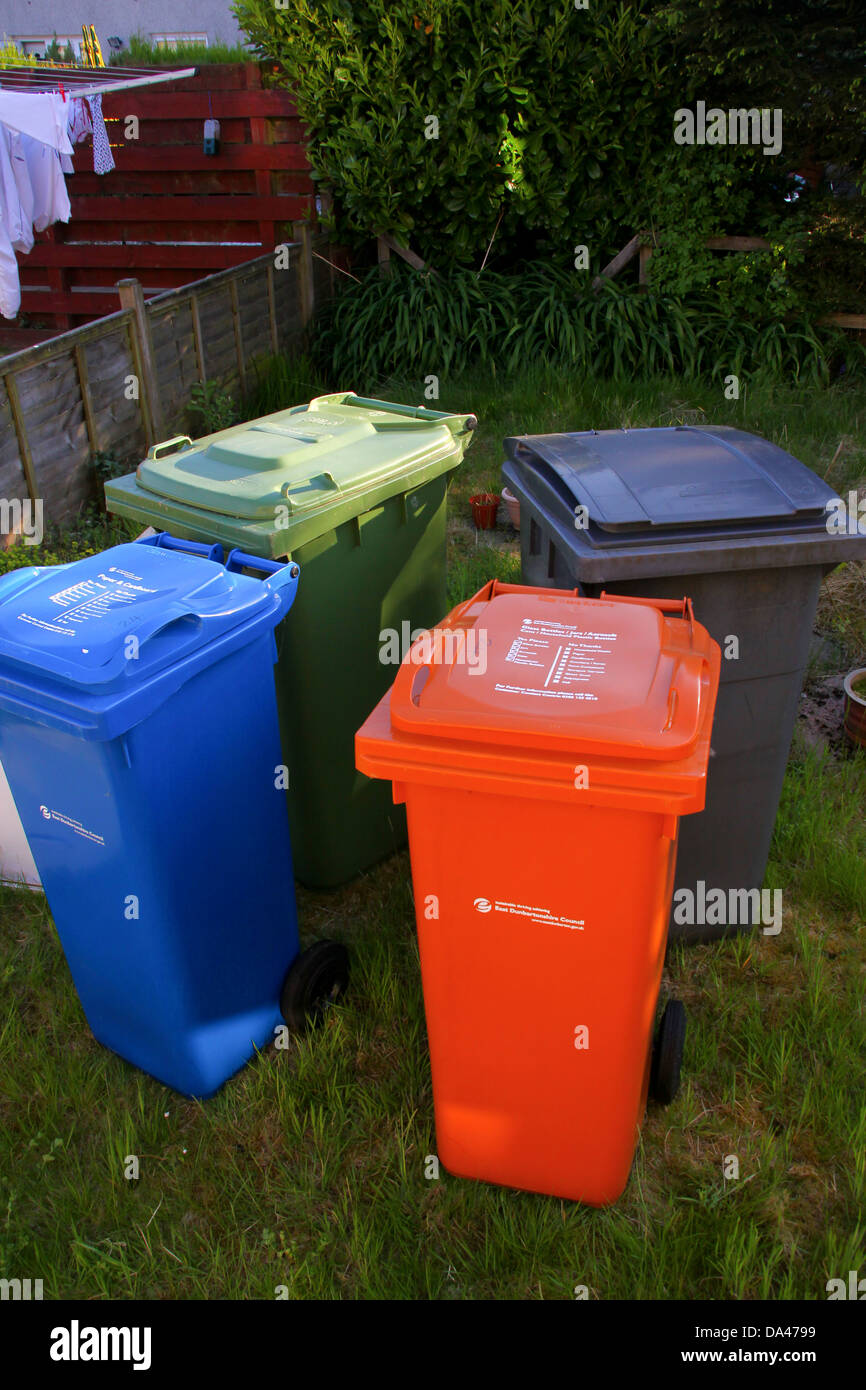 East Dunbartonshire recycling wheelie bins in garden Stock Photo Alamy