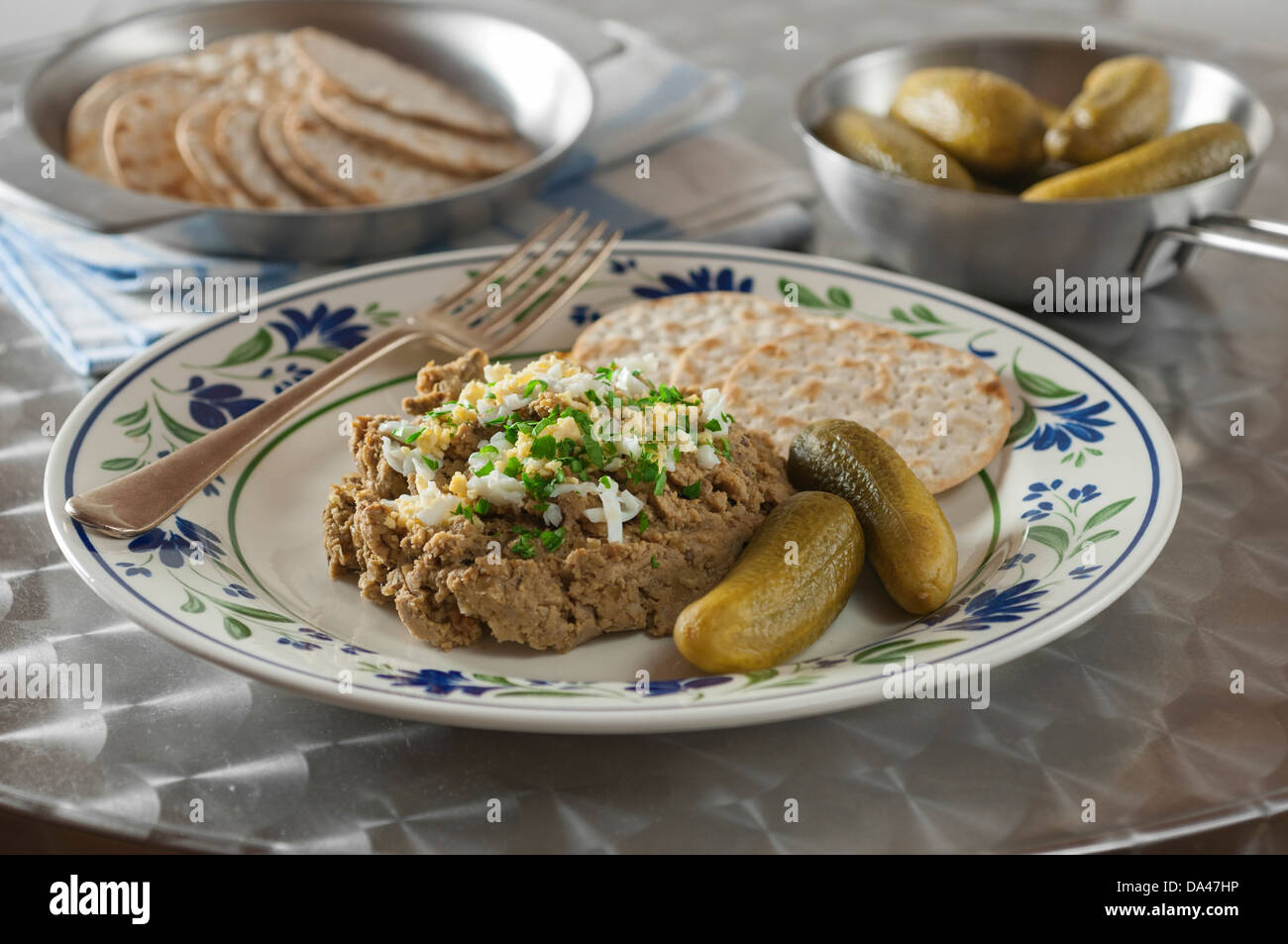 Chopped liver with matzo crackers and pickles Stock Photo