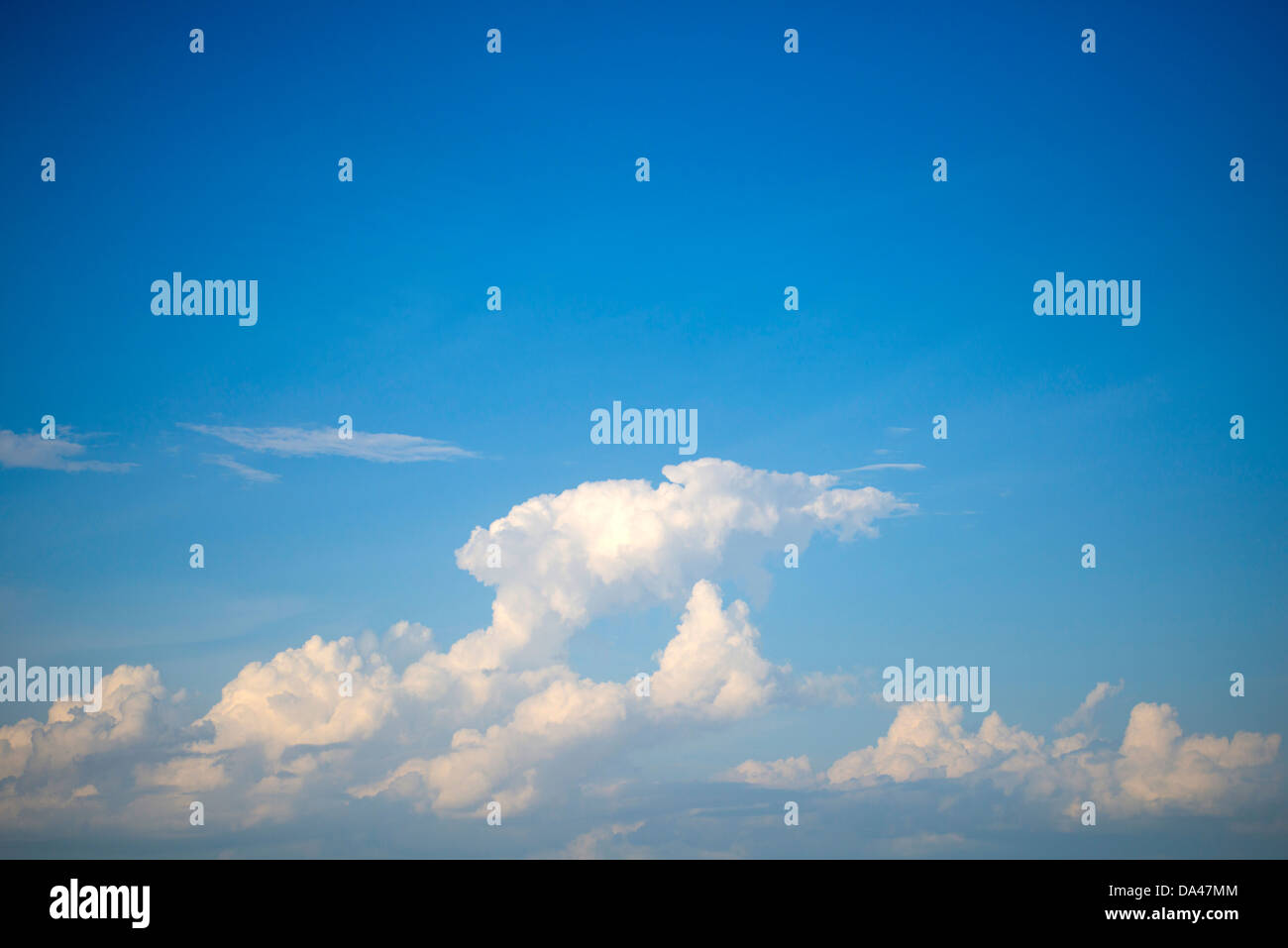 Puffy White Clouds against a Blue Sky Stock Photo - Alamy