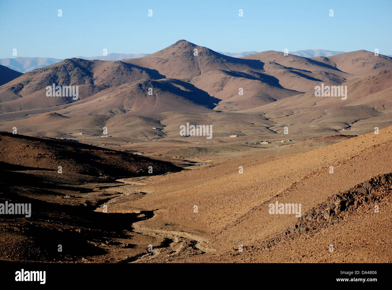 View of mountainous desert landscape, Djebel Sarhro, Anti-Atlas, Atlas Mountains, Morocco, February Stock Photo