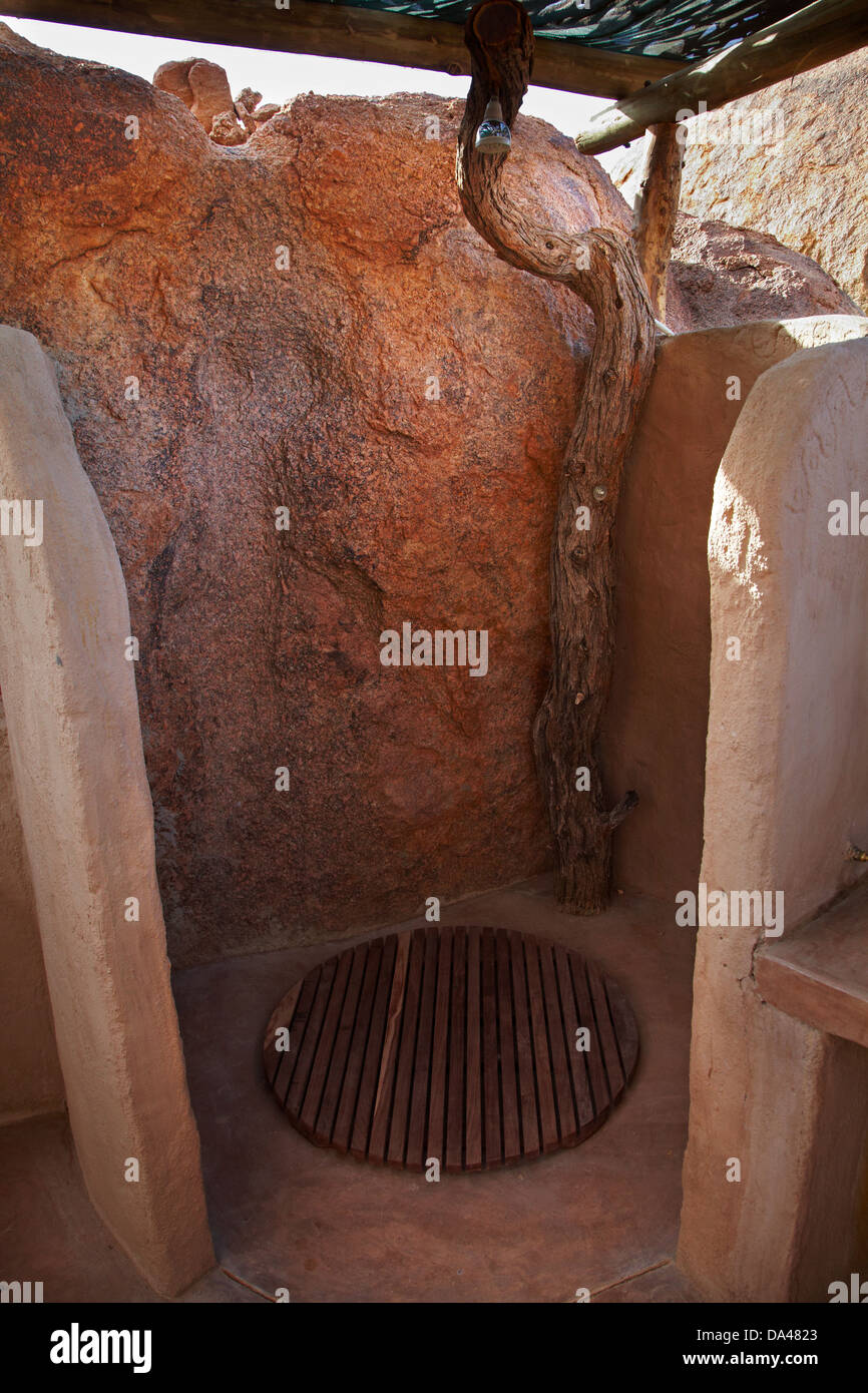 Open air shower at campsite at Mowani Mountain Camp, near Stock Photo