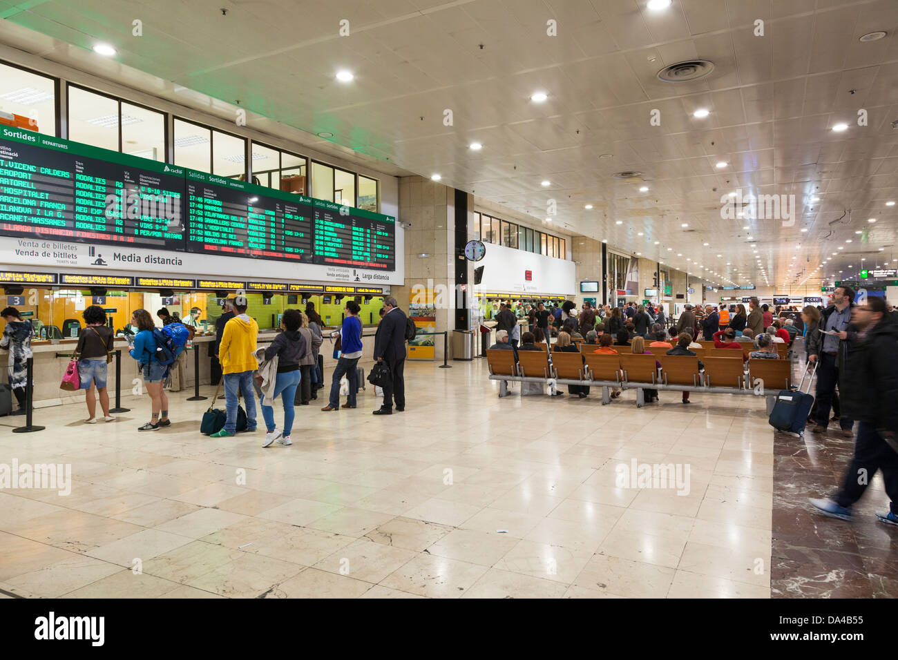 passengers in the ticket hall at Barcelona Sants Railway Station Stock Photo