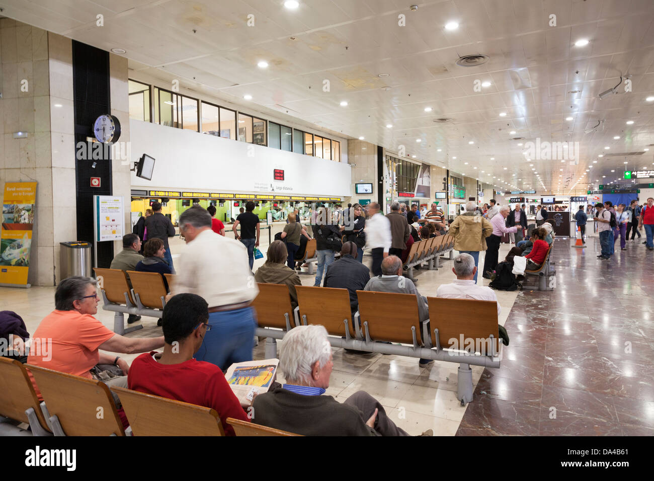 passengers waiting in the ticket hall at Barcelona Sants Railway Station Stock Photo
