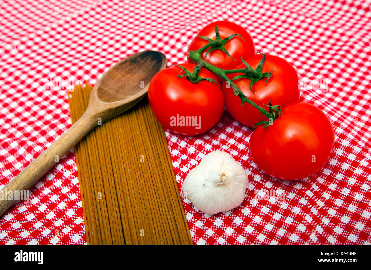 Spaghetti, Garlic and Tomato home cooking ingredients Stock Photo