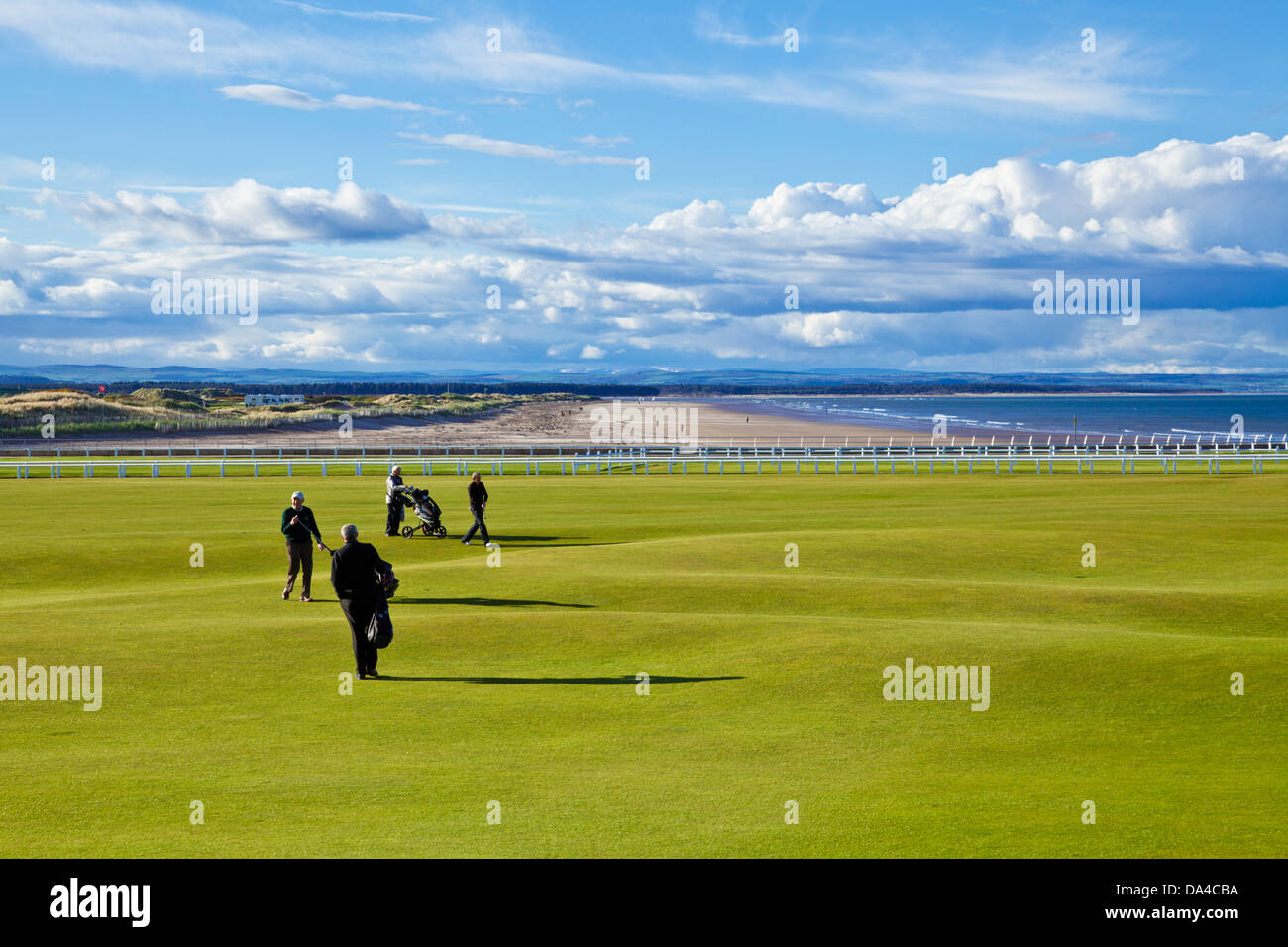 Four golfers playing at The Royal and Ancient Golf Club of St Andrews golf course St Andrews Fife Scotland UK GB EU Europe Stock Photo
