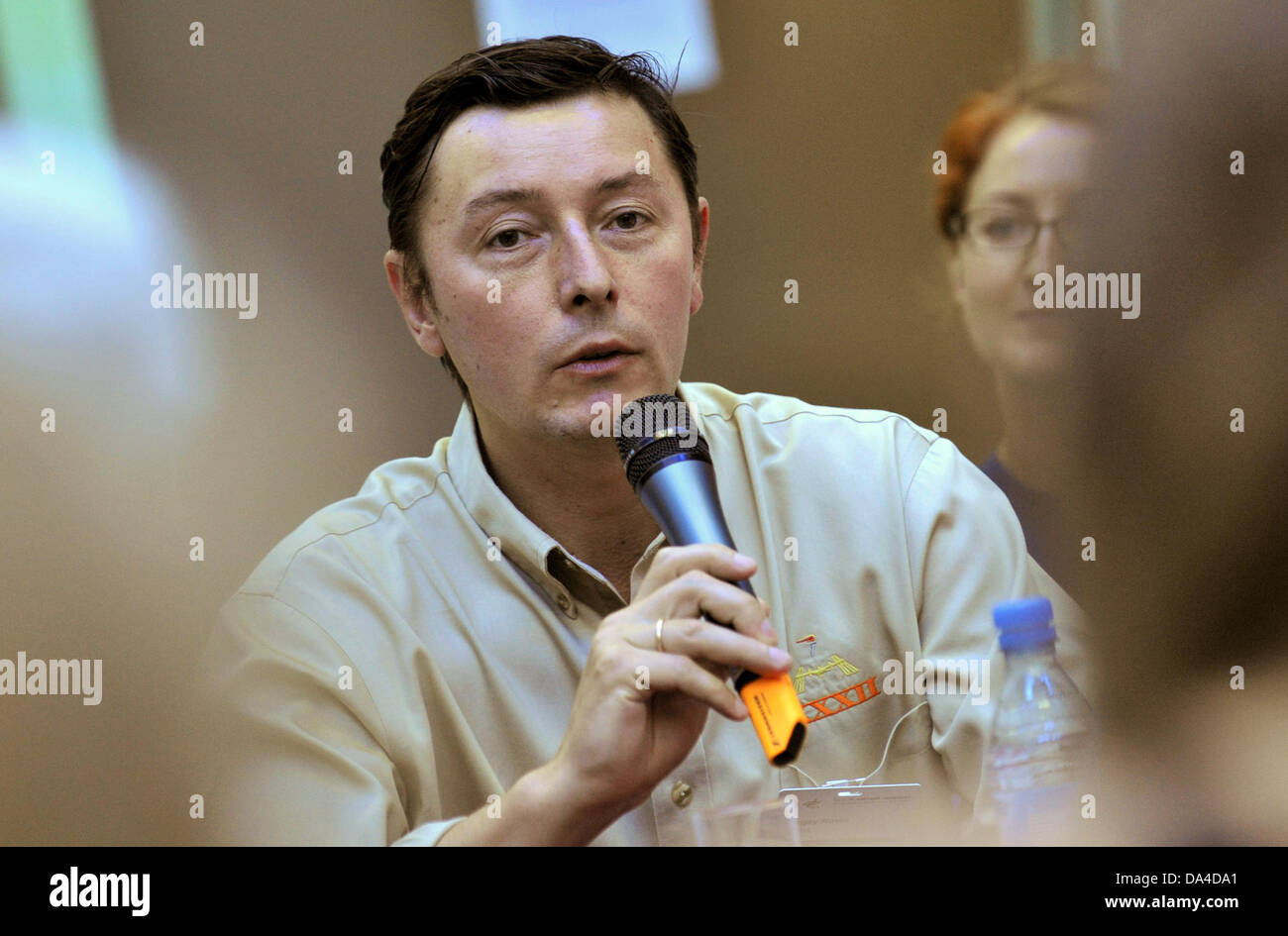 Russian cosmonaut Sergei Revin talks during a press event at the FEZ in ...