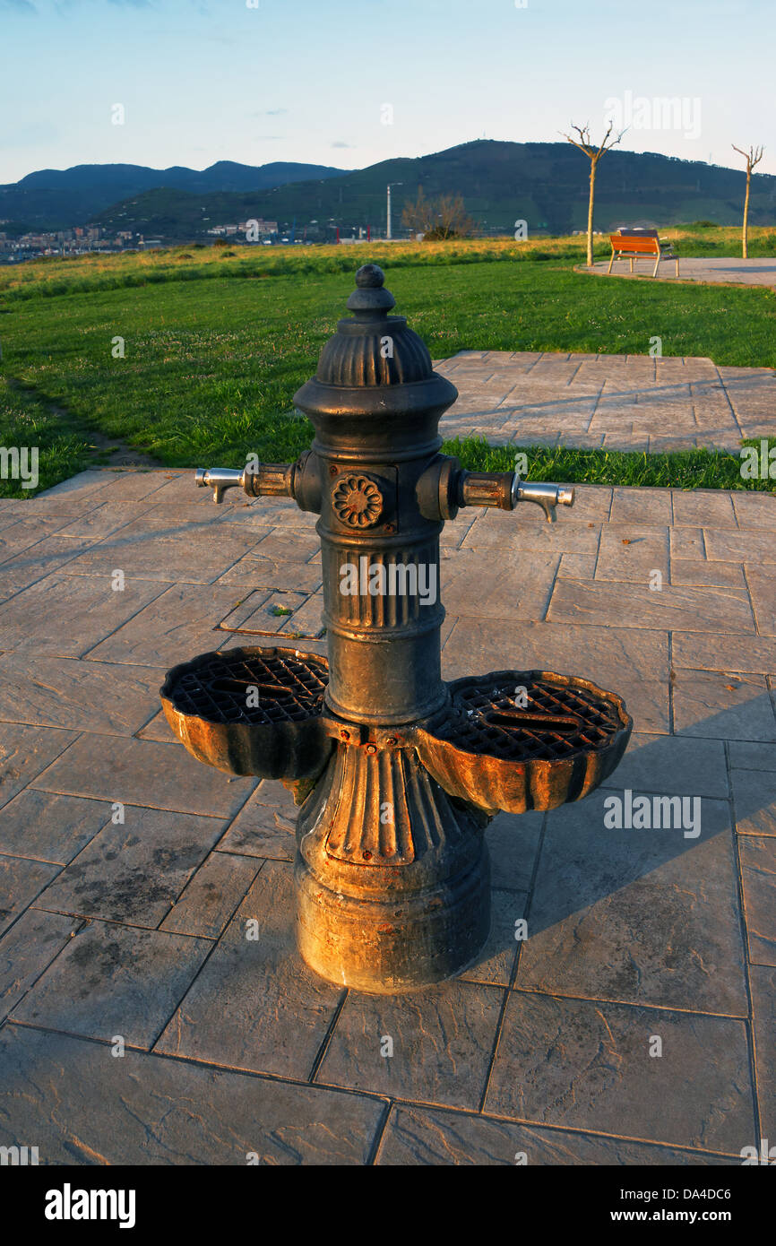 Drinking fountain with faucet Stock Photo