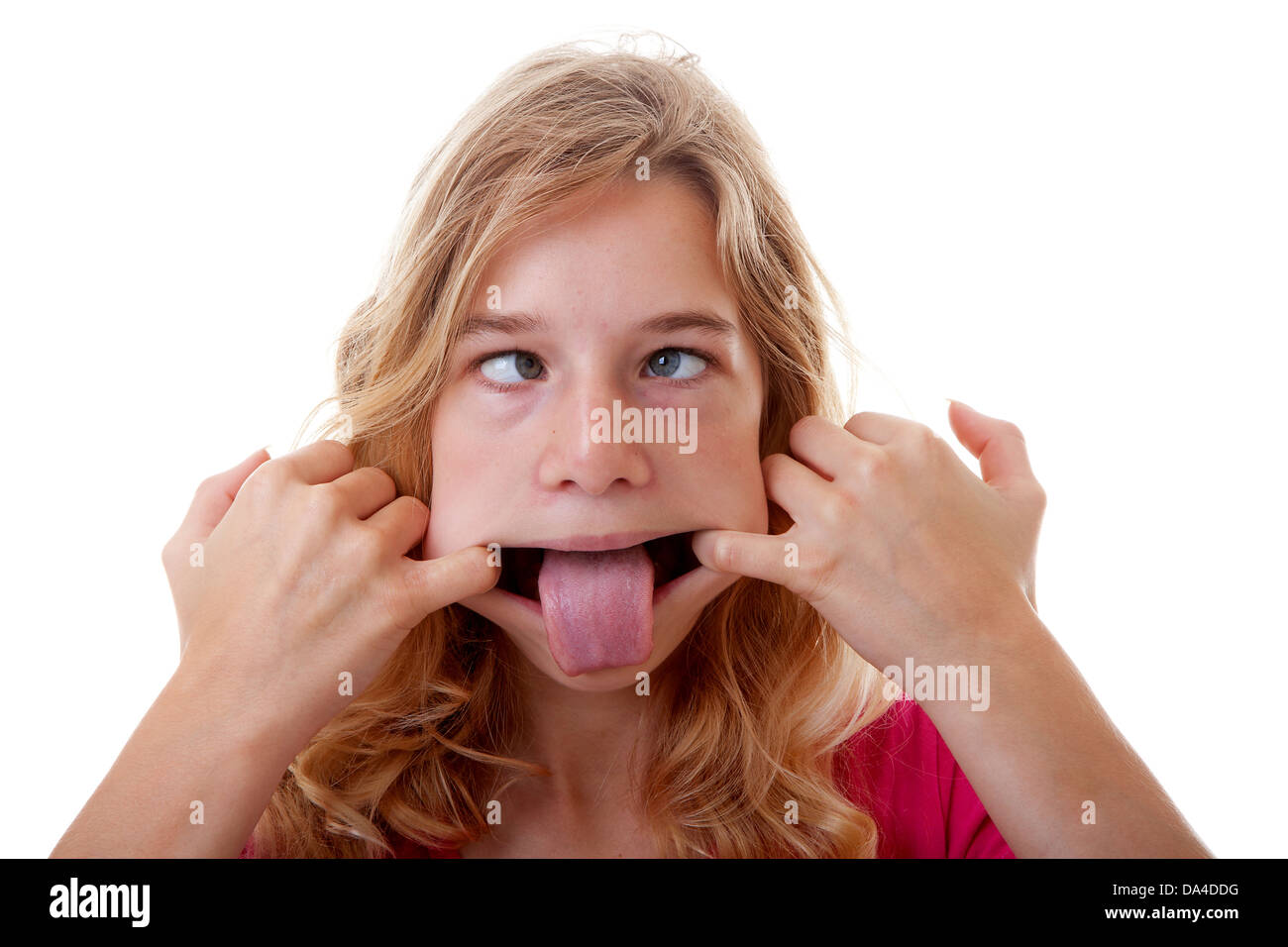 girl makes funny face in closeup over white background Stock Photo ...