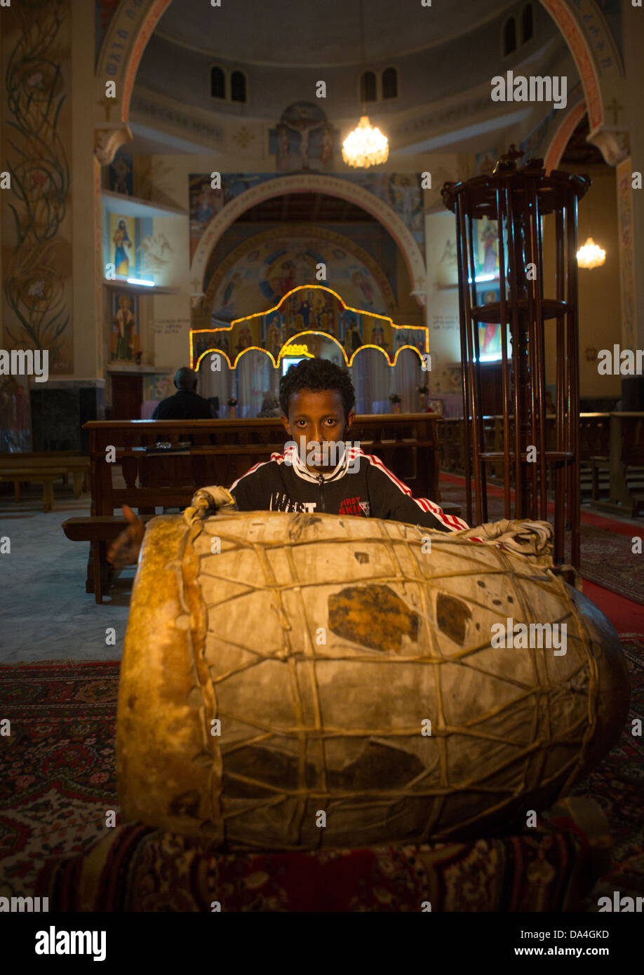 Boy Playing Drums In A Church, Asmara, Eritrea Stock Photo