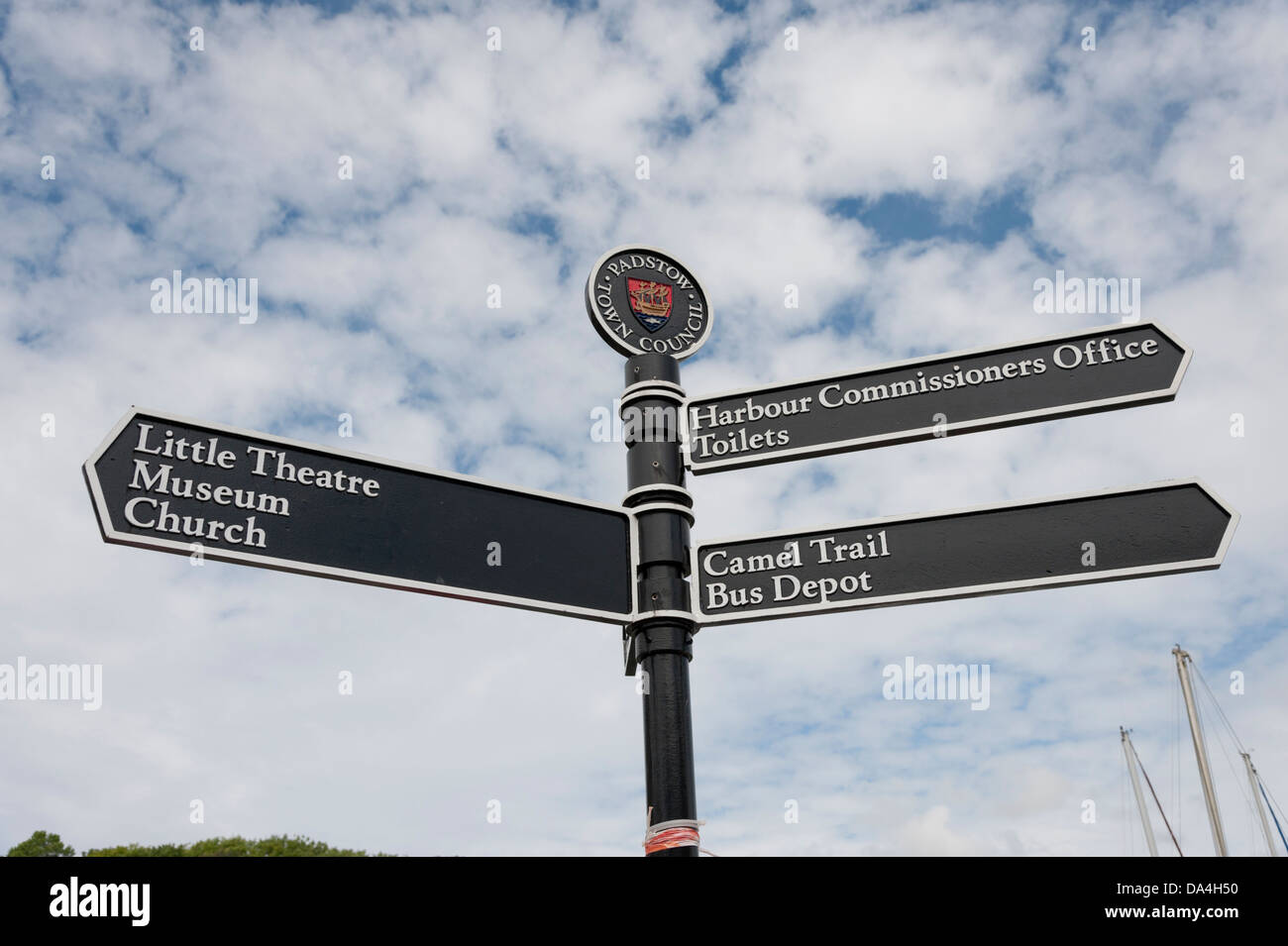 Signpost to tourist attractions at Padstow Cornwall UK Stock Photo