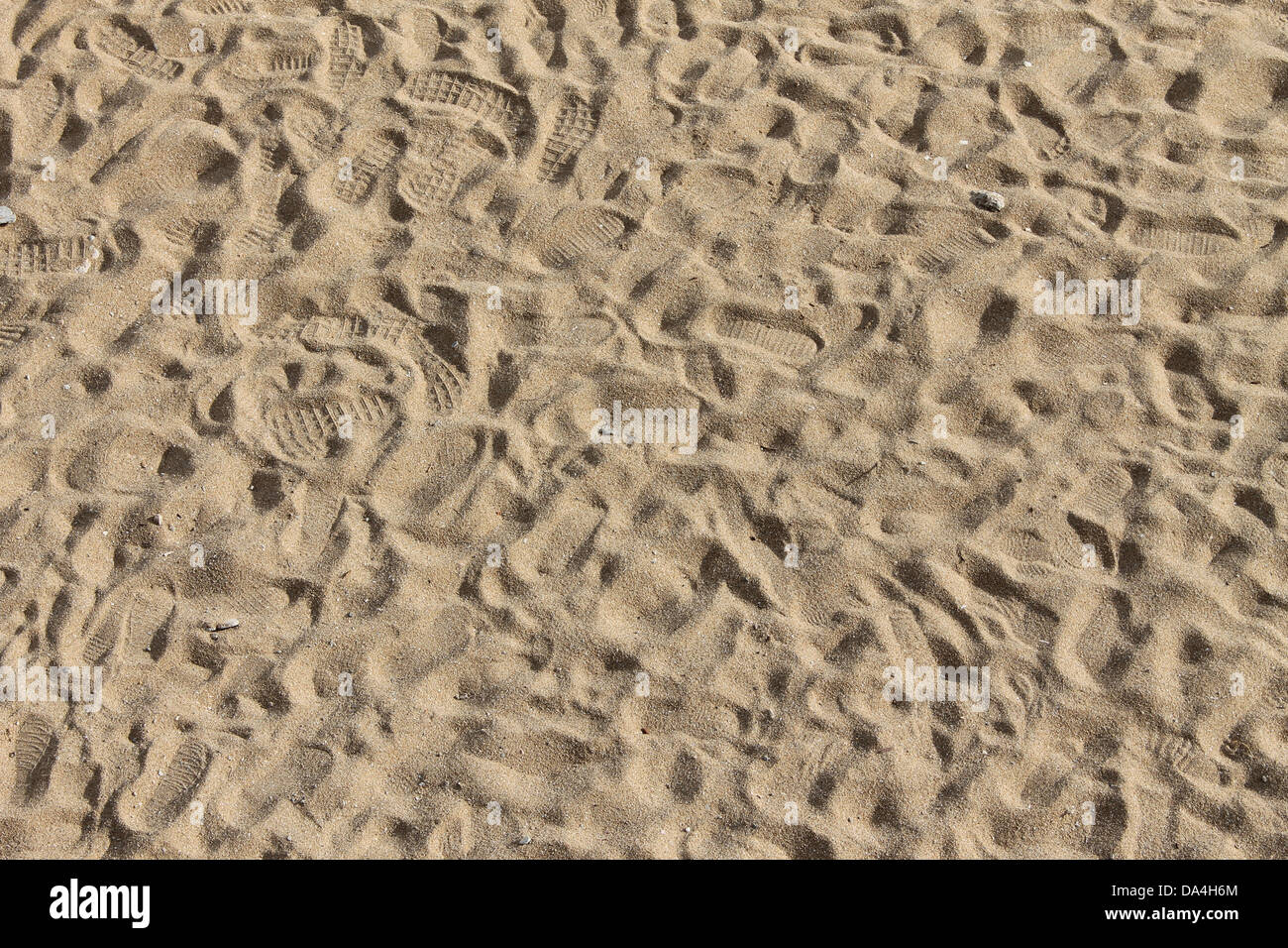 Footsteps in sand. Stock Photo