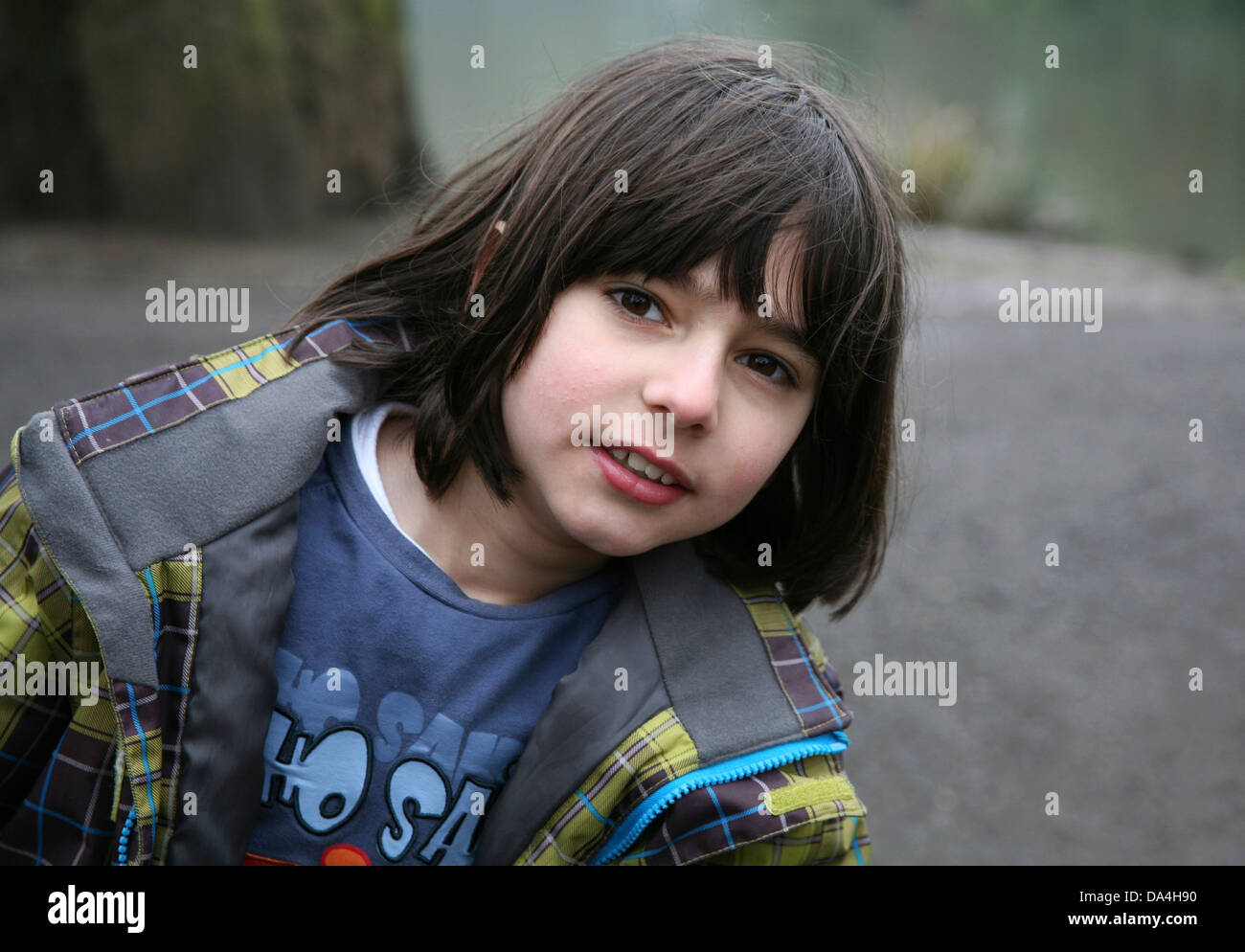 Long hair boy hi-res stock photography and images - Alamy