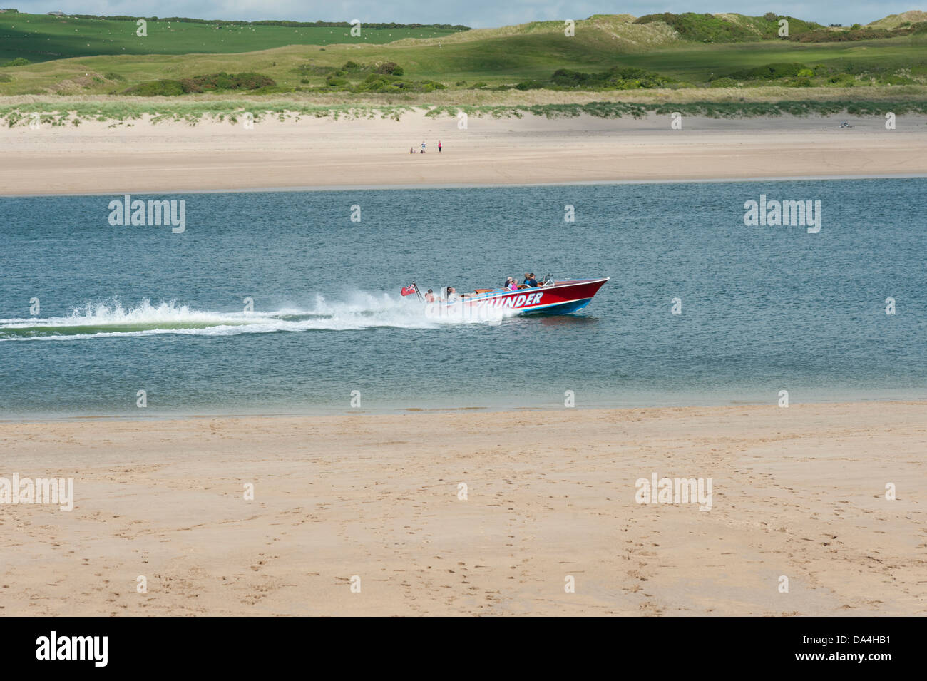 The tourist speedboat Thunder on the River Camel estuary at Padstow Cornwall UK Stock Photo