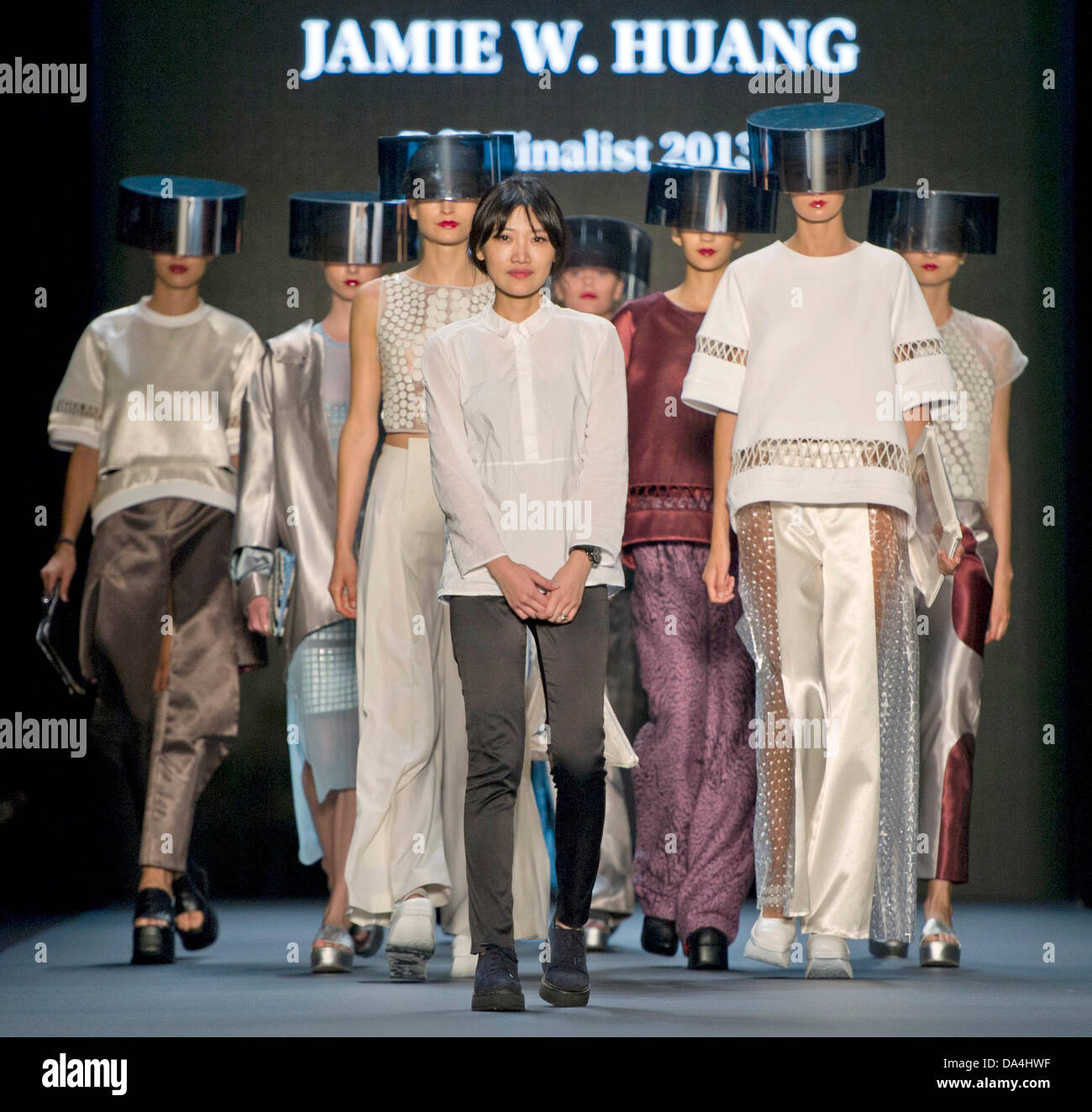 Berlin, Germany. 03rd July, 2013. Designer Jamie Wei Huang (C) and