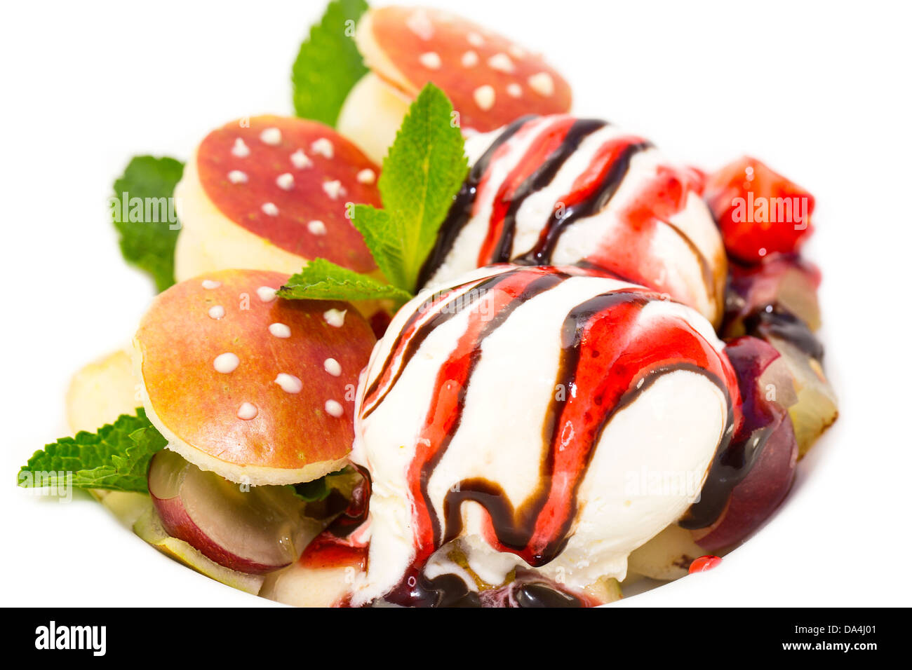 ice cream with caramel sauce and mint on a white background Stock Photo ...
