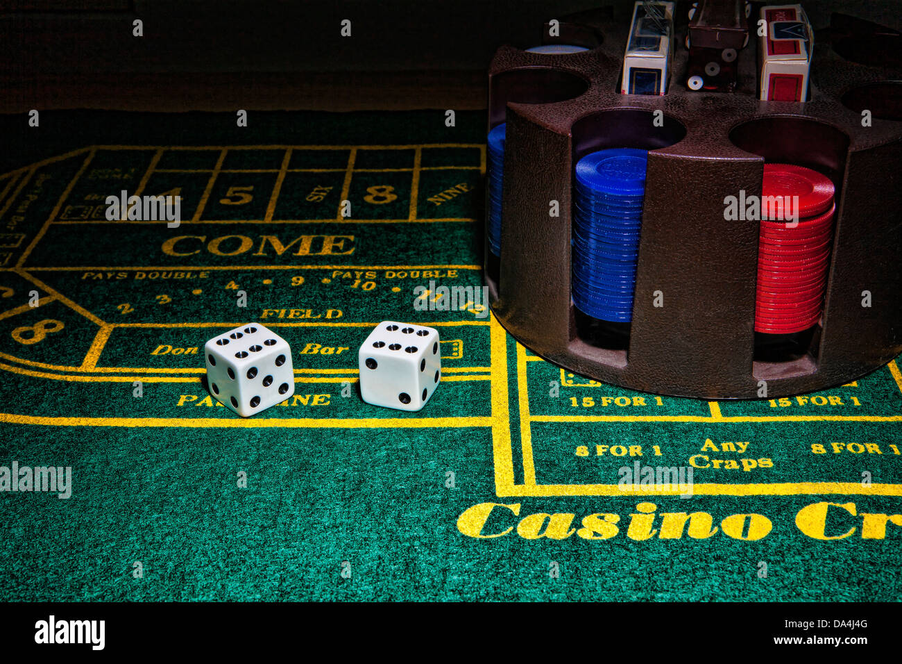green craps table with dice and chips Stock Photo Alamy