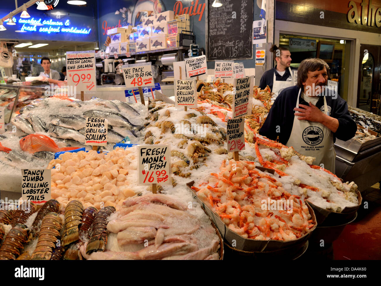 Fresh seafood stand at the Pike's Place Public Market. Seattle, Washington, USA Stock Photo Alamy