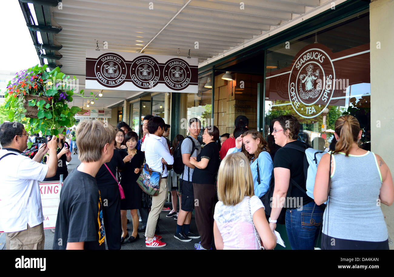 Tourists from all around the world visit the original Starbucks coffee shop. Seattle, Washington, USA Stock Photo