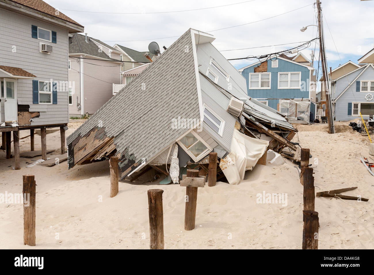 A hurricane leaves a path of destruction destroying homes and houses. Stock Photo
