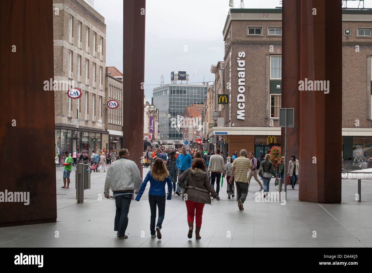People in the center of EIndhoven with a Mc Donalds and C&A in the background. Stock Photo