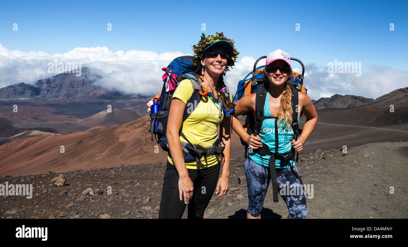 Hikers on the Sliding Sands Trail at Haleakala National Park on Maui Stock Photo