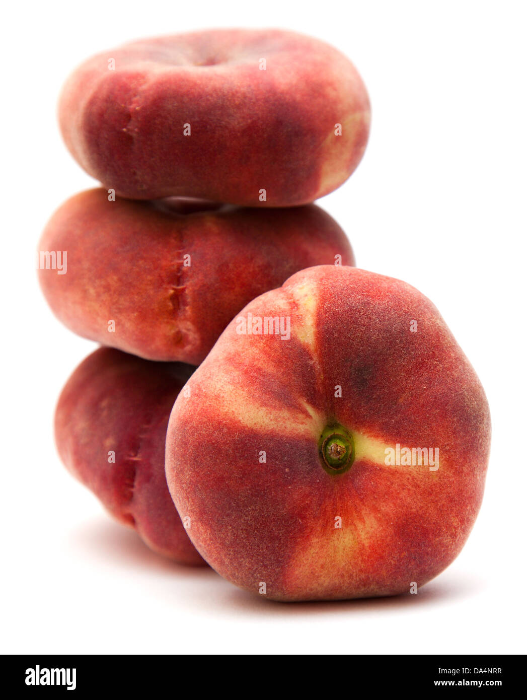 donut peaches isolated on white (Paraguayos; Saturn Peaches; Chinese
