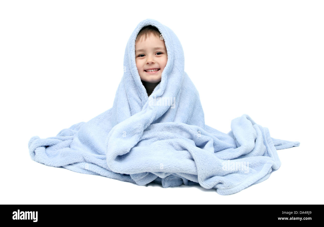 Child after bath sitting on bed Stock Photo