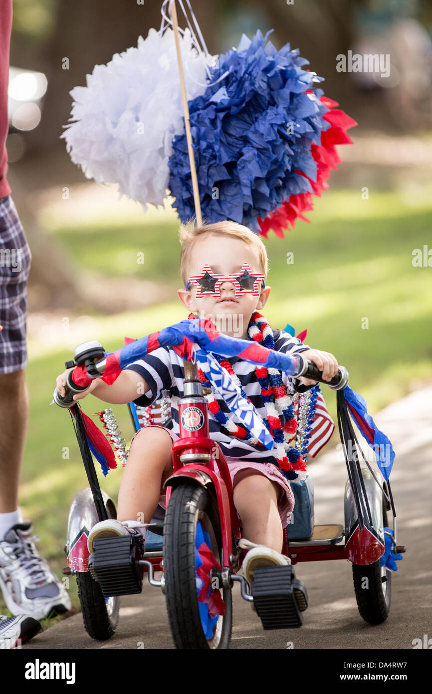 Residents of Daniel Island celebrate Independence Day early with a bicycle and golf cart parade July 3, 2013 in Charleston, SC. Stock Photo