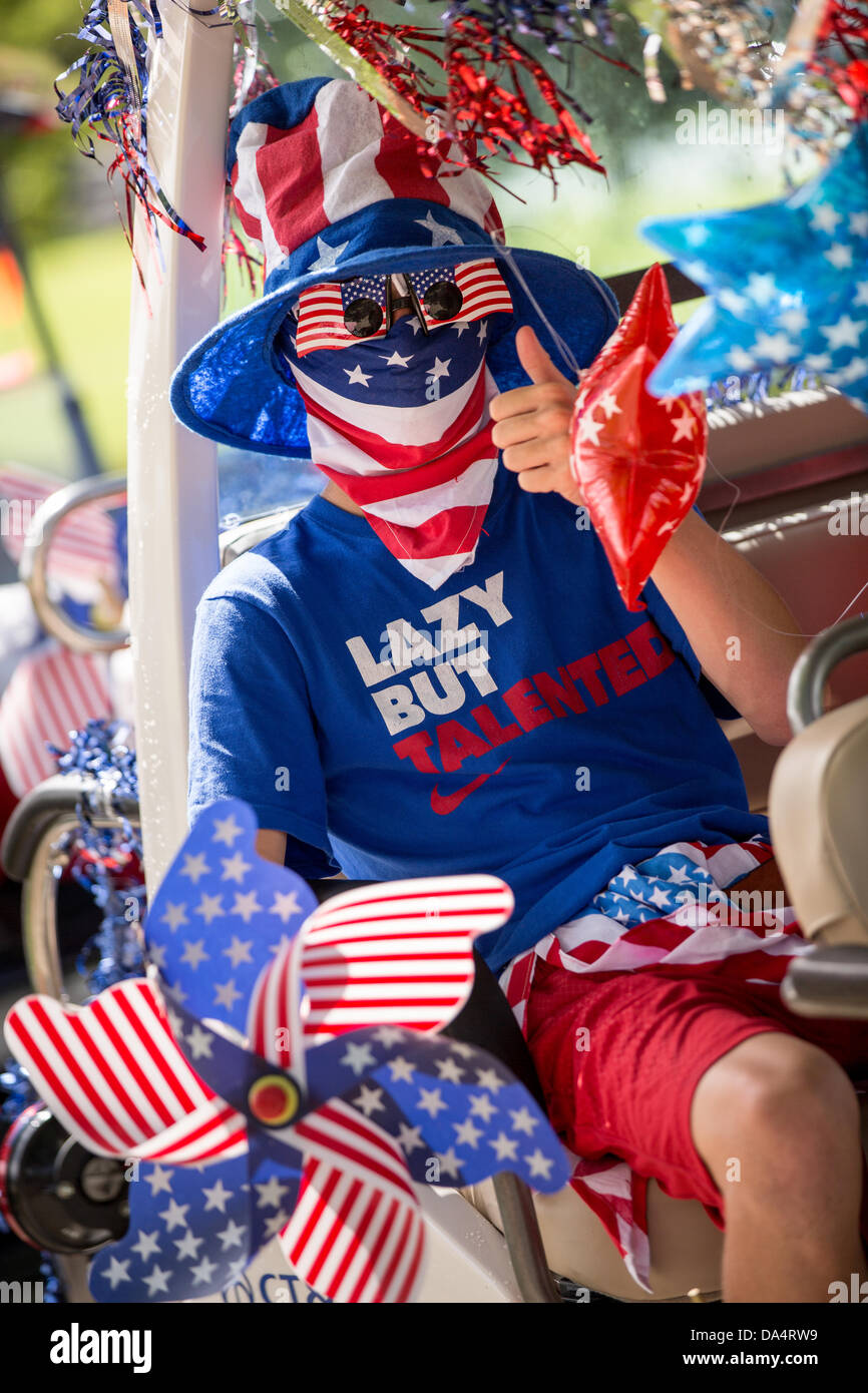 Residents of Daniel Island celebrate Independence Day early with a bicycle and golf cart parade July 3, 2013 in Charleston, SC. Stock Photo