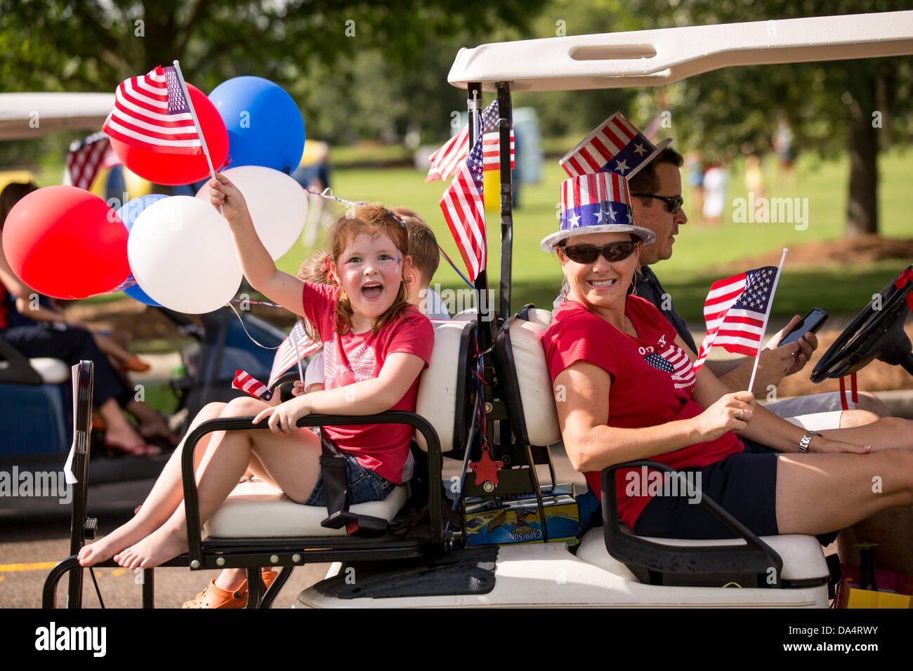 Residents of Daniel Island celebrate Independence Day early with a bicycle and golf cart parade July 3, 2013 in Charleston, SC. Stock Photo