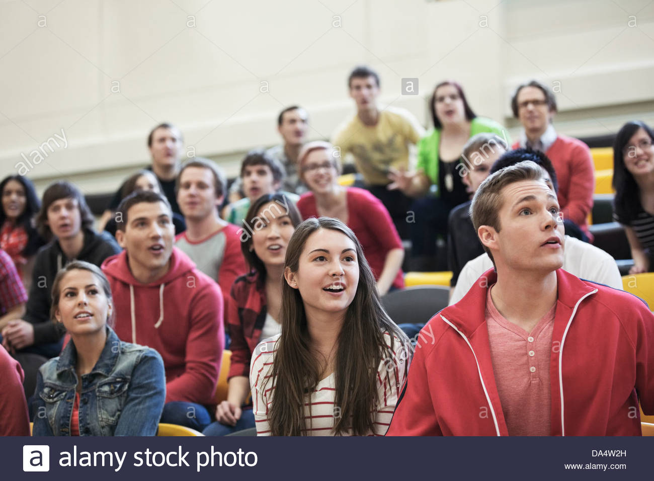 Large group of students watching college sporting event Stock Photo