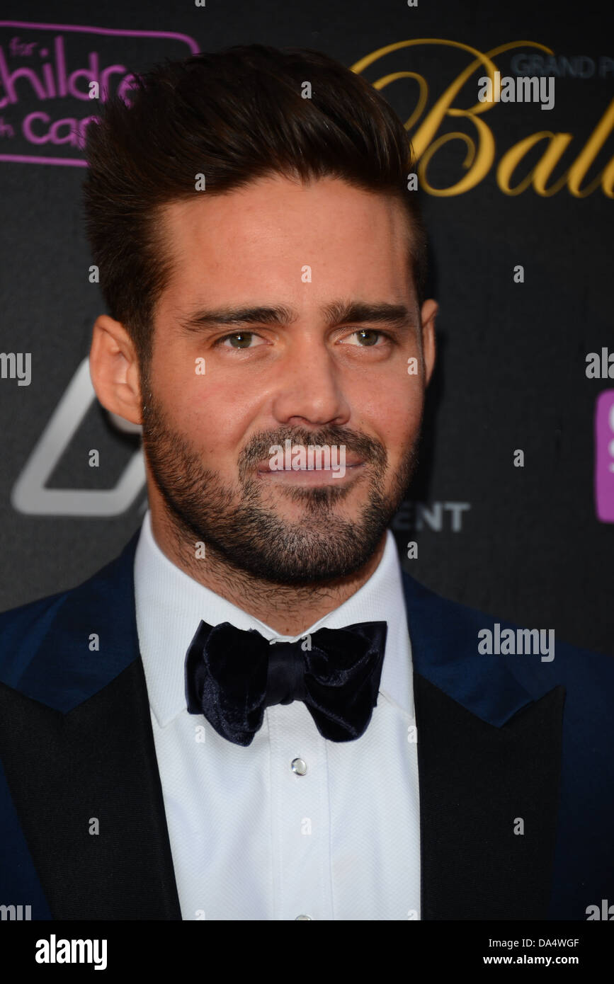 Spencer Matthews, Hugo Taylor and a female guest arrive at the Grand Prix Ball fundrises for children with cancer 'CLIC Sargent' Stock Photo