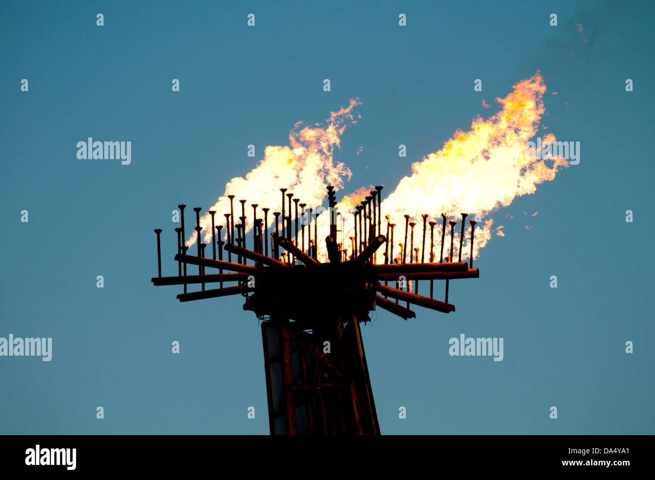 Gas flare of an offshore FPSO oil rig Stock Photo - Alamy