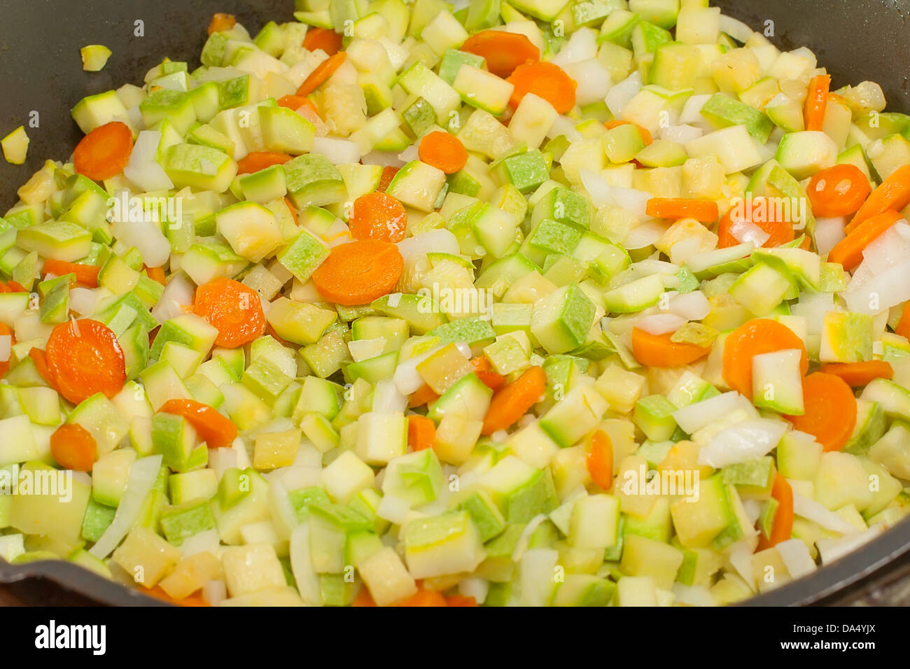 quenching of diced of vegetables to saute closeup Stock Photo