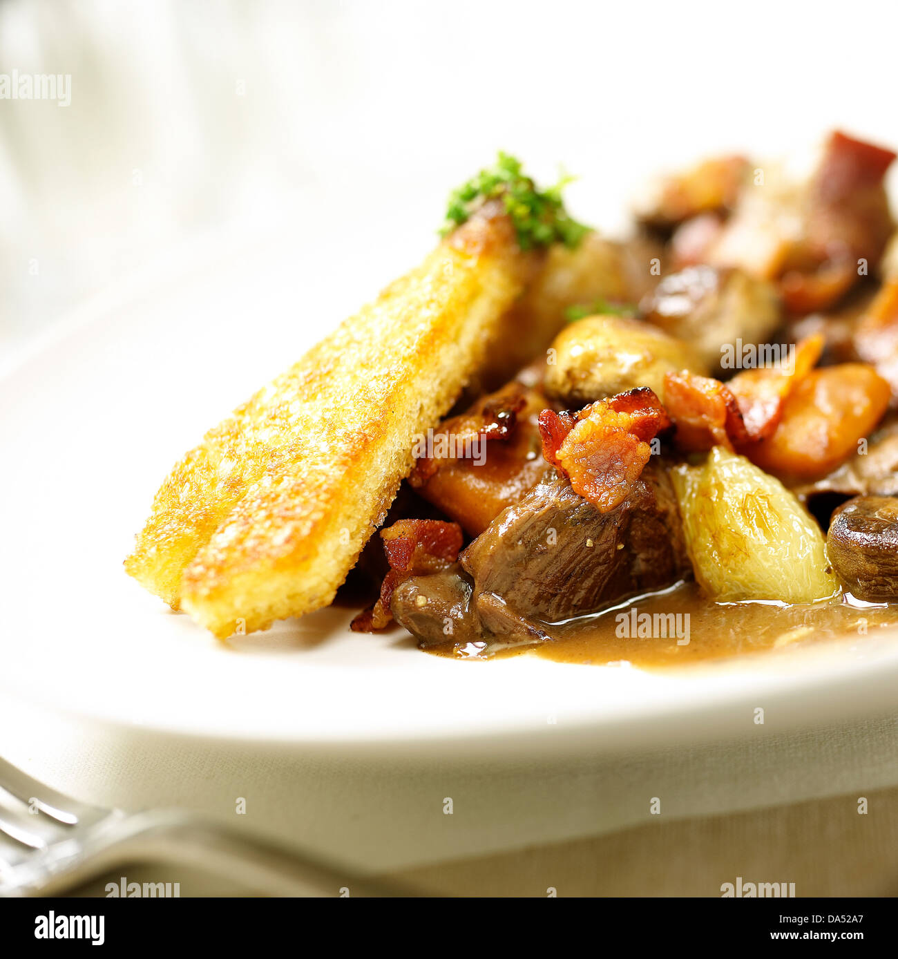 Beef bourguignon. a stew prepared with beef braised in red wine