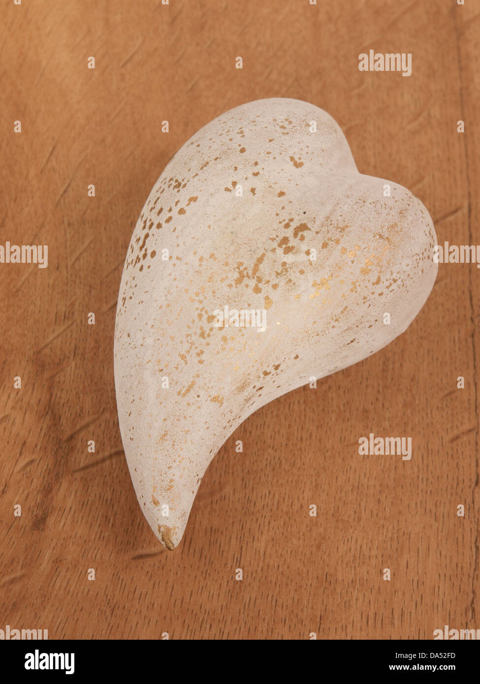Heart shape on a wooden background Stock Photo - Alamy