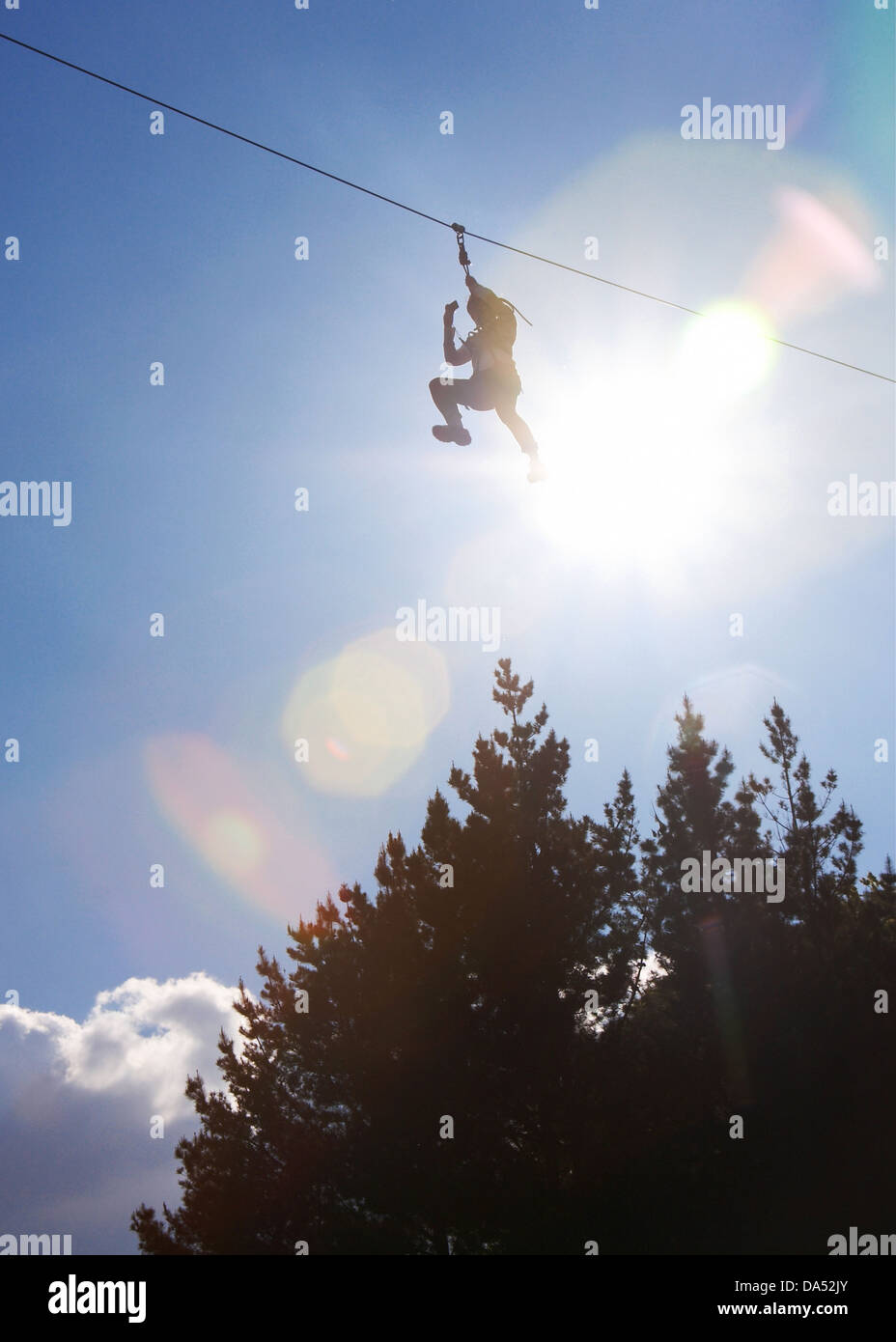 Person on a zip wire at Center parcs, Longleat, England, UK. Stock Photo