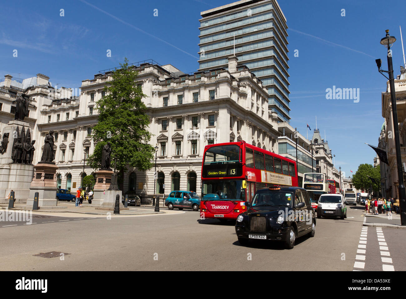 Black London cab/taxi and red London Bus, Pall Mall, London, England, UK Stock Photo
