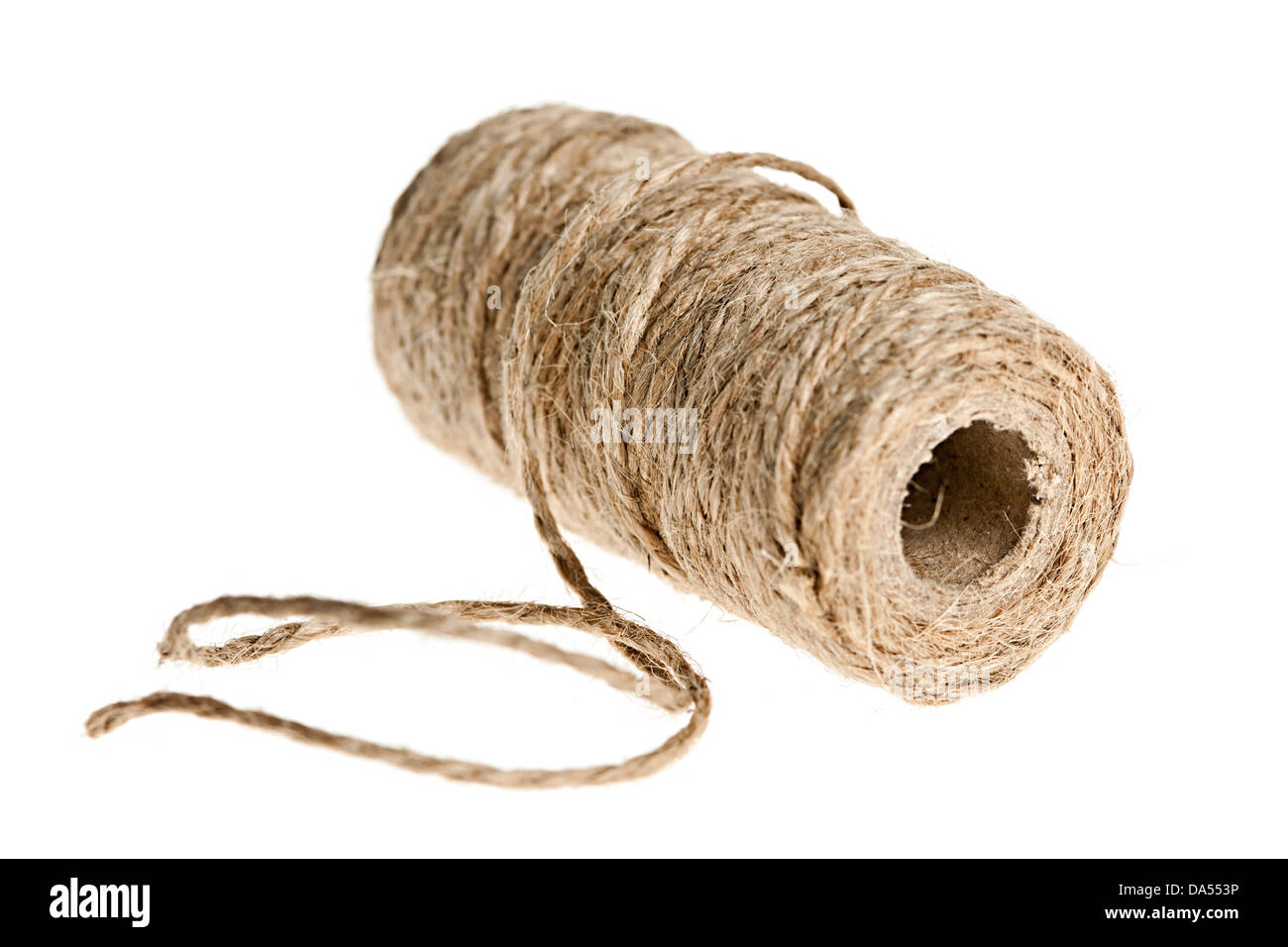 Several pieces of brown string on a white background Stock Photo - Alamy