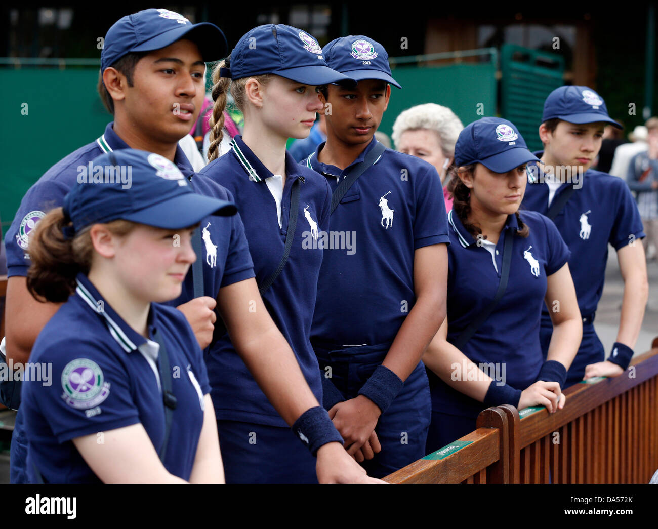 Wimbledon, London, UK. 03rd July, 2013. Day Nine of the The Wimbledon Tennis Championships 2013 held at The All England Lawn Tennis and Croquet Club, London, England, UK. Ball Boys and Girls waiting to  on Court 7 Credit:  Action Plus Sports Images/Alamy Live News Stock Photo