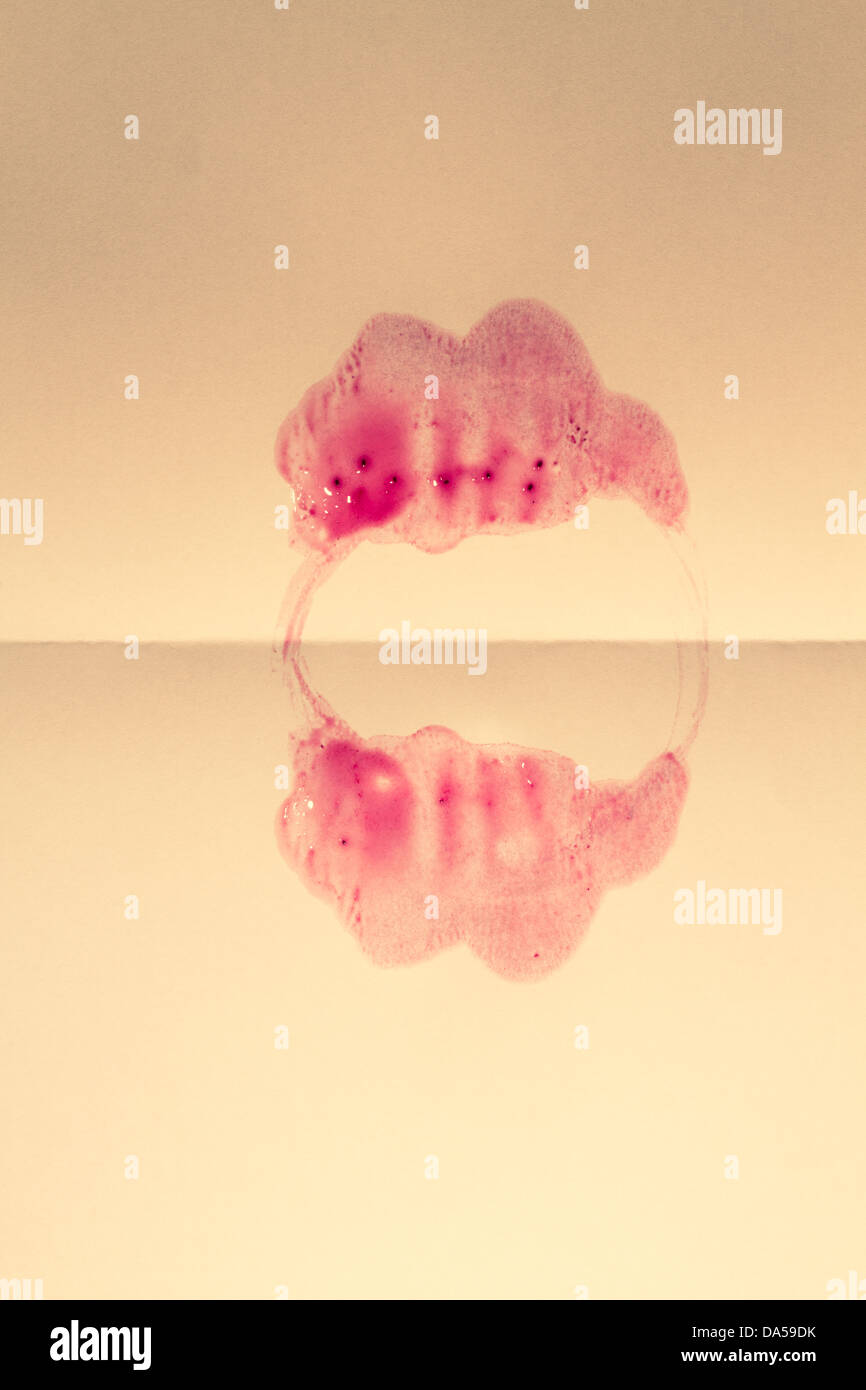 Pink stain on paper Stock Photo Alamy