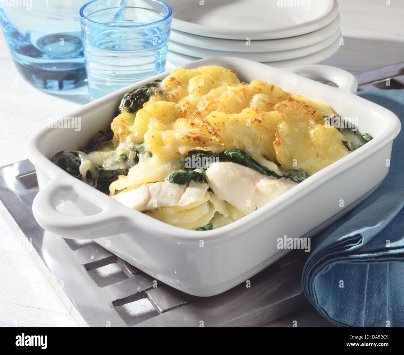 Fish gratin with spinach and potatoes Stock Photo Alamy