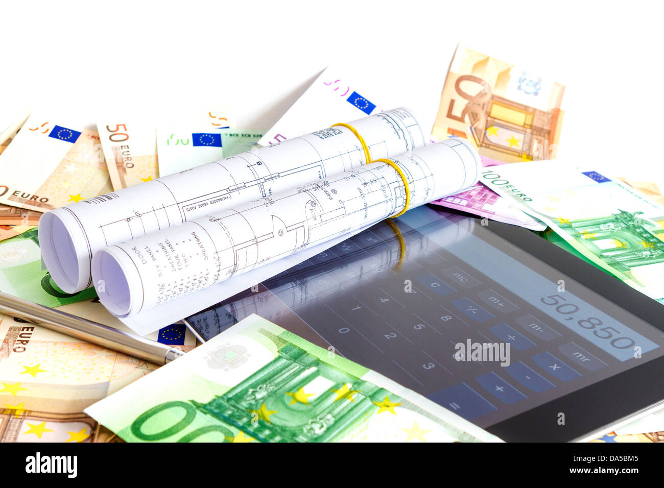 Digital Tablet and Blueprints Stock Photo