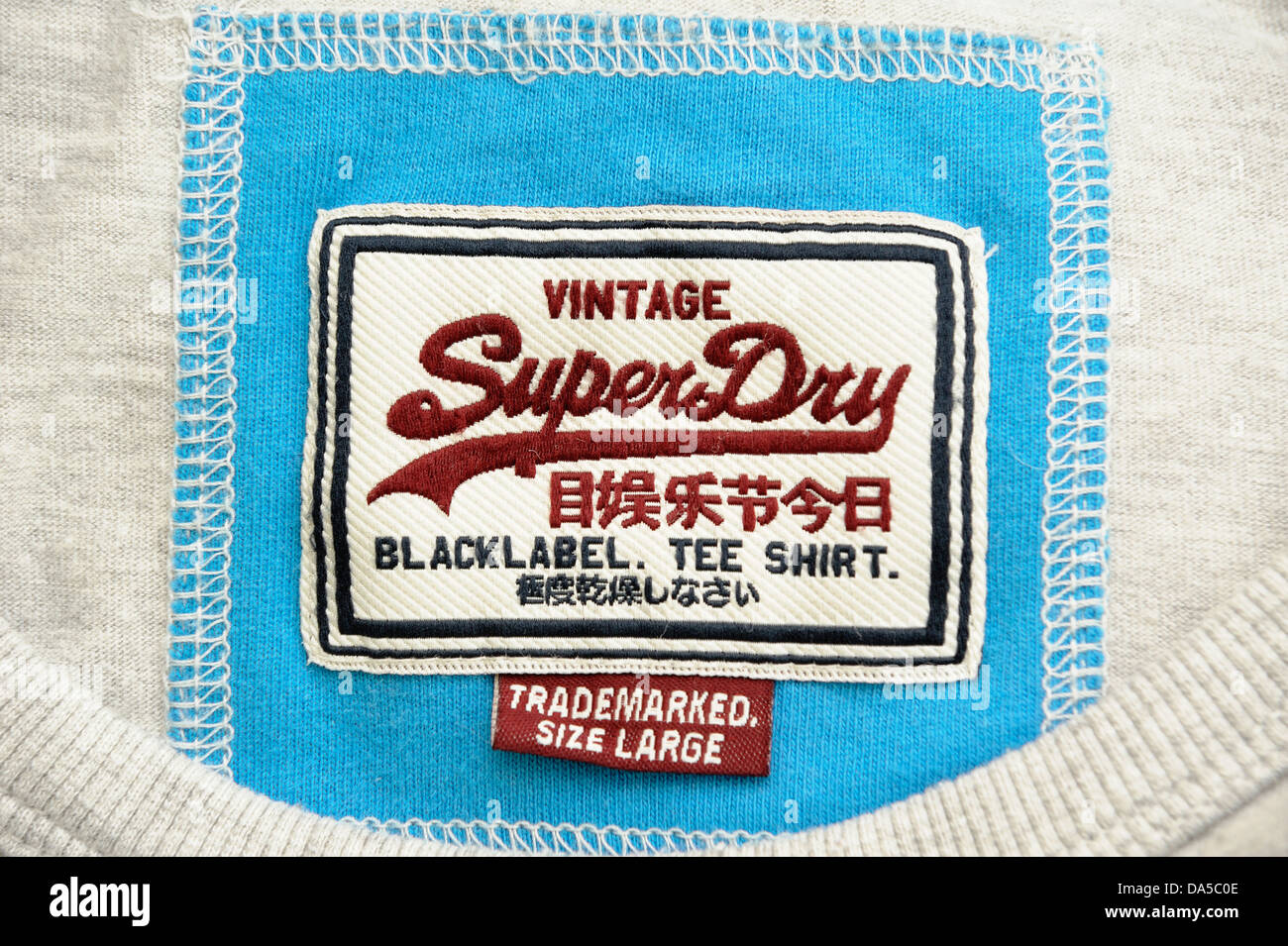 superdry clothing garment size label Stock Photo - Alamy
