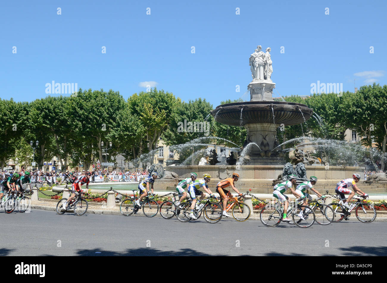 Competitors or Cyclists Cycle Past the La Rotonde Fountain Aix-en-Provence during the Tour de France Bike Race Aix-en-Provence Credit:  Chris Hellier/Alamy Live News Stock Photo